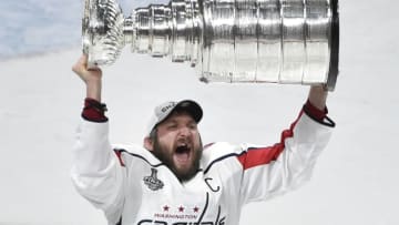 LAS VEGAS, NV - JUNE 07: Alex Ovechkin #8 of the Washington Capitals hoists the Stanley Cup after the team's 4-3 win over the Vegas Golden Knights in Game Five of the 2018 NHL Stanley Cup Final at T-Mobile Arena on June 7, 2018 in Las Vegas, Nevada. (Photo by David Becker/NHLI via Getty Images)
