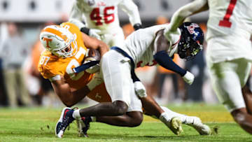 Oct 16, 2021; Knoxville, Tennessee, USA; Tennessee Volunteers tight end Jacob Warren (87) is tackled by Mississippi Rebels defensive back Otis Reese (3) during the second half at Neyland Stadium. Mandatory Credit: Bryan Lynn-USA TODAY Sports