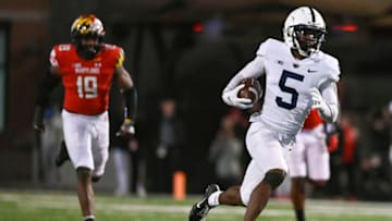 Penn State Nittany Lions wide receiver Jahan Dotson (5) runs a fourth quarter touchdown as Maryland Terrapins linebacker Ahmad McCullough (19) defends at Capital One Field at Maryland Stadium. Mandatory Credit: Tommy Gilligan-USA TODAY Sports
