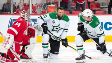 DETROIT, MI - JANUARY 16: Petr Mrazek #34 of the Detroit Red Wings talks with Martin Hanzal #10 and Radek Faksa #12 of the Dallas Stars during warm-ups prior to an NHL game at Little Caesars Arena on January 16, 2018 in Detroit, Michigan. (Photo by Dave Reginek/NHLI via Getty Images)