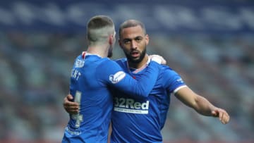 GLASGOW, SCOTLAND - NOVEMBER 08: Kemar Roofe of Rangers celebrates with team mate Ryan Kent after scoring his sides second goal during the Ladbrokes Scottish Premiership match between Rangers and Hamilton Academical at Ibrox Stadium on November 08, 2020 in Glasgow, Scotland. Sporting stadiums around the UK remain under strict restrictions due to the Coronavirus Pandemic as Government social distancing laws prohibit fans inside venues resulting in games being played behind closed doors. (Photo by Ian MacNicol/Getty Images)