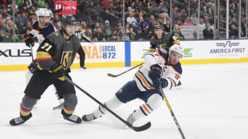 LAS VEGAS, NEVADA - MARCH 17: Connor McDavid #97 of the Edmonton Oilers steals the puck from William Karlsson #71 of the Vegas Golden Knights in the second period of their game at T-Mobile Arena on March 17, 2019 in Las Vegas, Nevada. The Golden Knights defeated the Oilers 6-3. (Photo by Ethan Miller/Getty Images)