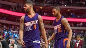 Apr 8, 2015; Dallas, TX, USA; Phoenix Suns forward Markieff Morris (11) and forward Marcus Morris (15) during the game against the Dallas Mavericks at the American Airlines Center. The Mavericks defeated the Suns 107-104. Mandatory Credit: Jerome Miron-USA TODAY Sports