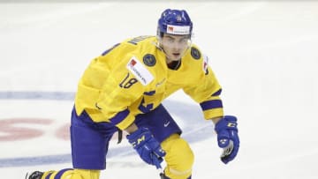 VICTORIA , BC - DECEMBER 29: Jacob Olofsson #18 of Sweden versus the United States at the IIHF World Junior Championships at the Save-on-Foods Memorial Centre on December 29, 2018 in Victoria, British Columbia, Canada. (Photo by Kevin Light/Getty Images)