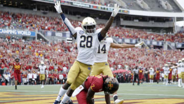 ORLANDO, FL - DECEMBER 28: TaRiq Bracy #28 of the Notre Dame Fighting Irish celebrates after breaking up a pass in the end zone against La'Michael Pettway #7 of the Iowa State Cyclones in the second quarter of the Camping World Bowl at Camping World Stadium on December 28, 2019 in Orlando, Florida. (Photo by Joe Robbins/Getty Images)