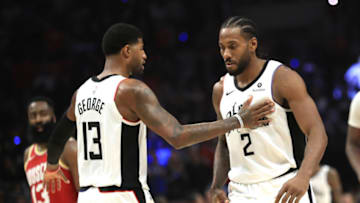 LOS ANGELES, CALIFORNIA - NOVEMBER 22: Kawhi Leonard #2 is congratulated by Paul George #13 of the Los Angeles Clippers during the second half of a game against the Houston Rockets at Staples Center on November 22, 2019 in Los Angeles, California. NOTE TO USER: User expressly acknowledges and agrees that, by downloading and/or using this photograph, user is consenting to the terms and conditions of the Getty Images License Agreement (Photo by Sean M. Haffey/Getty Images)