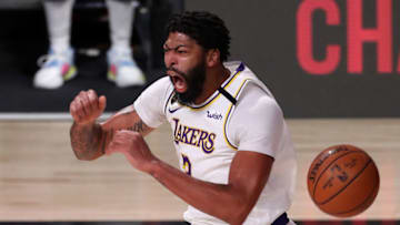 LAKE BUENA VISTA, FLORIDA - SEPTEMBER 08: Anthony Davis #3 of the Los Angeles Lakers reacts to his dunk during the first quarter against the Houston Rockets in Game Three of the Western Conference Second Round during the 2020 NBA Playoffs at AdventHealth Arena at the ESPN Wide World Of Sports Complex on September 08, 2020 in Lake Buena Vista, Florida. NOTE TO USER: User expressly acknowledges and agrees that, by downloading and or using this photograph, User is consenting to the terms and conditions of the Getty Images License Agreement. (Photo by Mike Ehrmann/Getty Images)