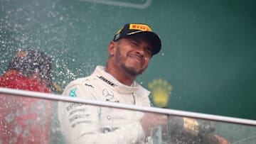 BAKU, AZERBAIJAN - APRIL 29: Race winner Lewis Hamilton of Great Britain and Mercedes GP celebrates on the podium during the Azerbaijan Formula One Grand Prix at Baku City Circuit on April 29, 2018 in Baku, Azerbaijan. (Photo by Clive Mason/Getty Images)