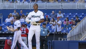 Miami Marlins outfielder Lewis Brinson (9) walks back to the Miami dugout after getting called out on a strike during the second inning against the Washington Nationals on Sunday, April 21, 2019 at Marlins Park in Miami, Fla. The Nationals beat the Marlins 5-0. (Daniel A. Varela/Miami Herald/TNS via Getty Images)