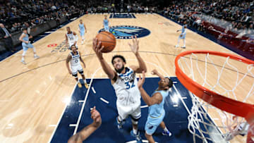 MINNEAPOLIS, MN - DECEMBER 1: Karl-Anthony Towns #32 of the Minnesota Timberwolves drives to the basket during a game against the Memphis Grizzlies. Copyright 2019 NBAE (Photo by David Sherman/NBAE via Getty Images)