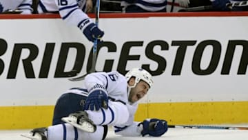WASHINGTON, DC - April 15: Toronto Maple Leafs defenseman Roman Polak (46) grimaces in pain after a second period injury against the Washington Capitals on April 15, 2017, at the Verizon Center in Washington, D.C. in Round 1 of the NHL Playoffs. (Photo by Mark Goldman/Icon Sportswire via Getty Images)