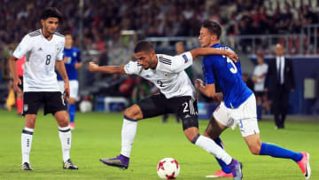 KRAKOW, POLAND - JUNE 24: Jeremy Toljan of Germany is fouled by Antonio Barreca of Italy during the 2017 UEFA European Under-21 Championship Group C match between Italy and Germany at Stadion Cracovia on June 24, 2017 in Krakow, Poland. (Photo by Stephen Pond/Getty Images)