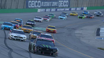 SPARTA, KENTUCKY - JULY 13: Kurt Busch, driver of the #1 Monster Energy Chevrolet, leads a pack of cars during the Monster Energy NASCAR Cup Series Quaker State 400 Presented by Walmart at Kentucky Speedway on July 13, 2019 in Sparta, Kentucky. (Photo by Matt Sullivan/Getty Images)