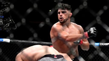 NEW YORK, NEW YORK - NOVEMBER 02: Kelvin Gastelum of the United States (R) fights against Darren Till of the United Kingdom in the Middleweight bout during UFC 244 at Madison Square Garden on November 02, 2019 in New York City. (Photo by Steven Ryan/Getty Images)