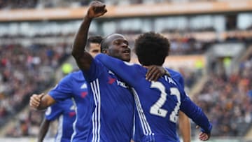 HULL, ENGLAND - OCTOBER 01: Willian of Chelsea (R) celebrates scoring his sides first goal with Victor Moses of Chelsea (C) during the Premier League match between Hull City and Chelsea at KCOM Stadium on October 1, 2016 in Hull, England. (Photo by Shaun Botterill/Getty Images)