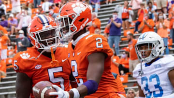 Sep 19, 2020; Clemson, SC, USA; Clemson wide receiver Frank Ladson Jr. (2) celebrates with quarterback D.J. Uiagalelei (5) after scoring a touchdown during the second quarter of their game on Saturday, Sept. 19, 2020. Mandatory Credit: Ken Ruinard/Greenville News-USA TODAY NETWORK