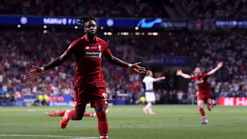 MADRID, SPAIN - JUNE 01: Divock Origi of Liverpool celebrates after scoring his team's second goal during the UEFA Champions League Final between Tottenham Hotspur and Liverpool at Estadio Wanda Metropolitano on June 01, 2019 in Madrid, Spain. (Photo by Laurence Griffiths/Getty Images)