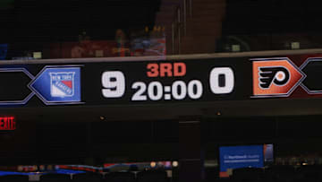 Mar 17, 2021; New York, New York, USA; The scoreboard at the end of the second period shows the New York Rangers leading the Philadelphia Flyers by the score of 9-0 at Madison Square. Mandatory Credit: Bruce Bennett/POOL PHOTOS-USA TODAY Sports