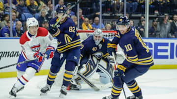 BUFFALO, NY - OCTOBER 05: Buffalo Sabres Center Jacob Josefson (10) tries to clear puck as Montreal Canadiens Right Wing Ales Hemsky (83) and Buffalo Sabres Defenseman Nathan Beaulieu (82) look on during the Montreal Canadiens and Buffalo Sabres NHL game on October 5, 2017, at KeyBank Center in Buffalo, NY. (Photo by John Crouch/Icon Sportswire via Getty Images)