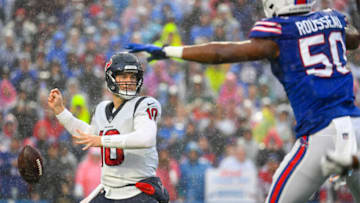 Oct 3, 2021; Orchard Park, New York, USA; Houston Texans quarterback Davis Mills (10) fumbles the ball. Mandatory Credit: Rich Barnes-USA TODAY Sports