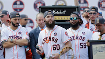 HOUSTON, TX - NOVEMBER 03: Dallas Keuchel #60 of the Houston Astros takes the stage during the Houston Astros Victory Parade on November 3, 2017 in Houston, Texas. The Astros defeated the Los Angeles Dodgers 5-1 in Game 7 to win the 2017 World Series. (Photo by Tim Warner/Getty Images)