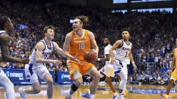 LAWRENCE, KANSAS - JANUARY 25: John Fulkerson #10 of the Tennessee Volunteers in defended by Christian Braun #2 of the Kansas Jayhawks at Allen Fieldhouse on January 25, 2020 in Lawrence, Kansas. (Photo by Ed Zurga/Getty Images)