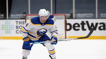 UNIONDALE, NEW YORK - MARCH 06: Taylor Hall #4 of the Buffalo Sabres skates against the New York Islanders at the Nassau Coliseum on March 06, 2021 in Uniondale, New York. (Photo by Bruce Bennett/Getty Images)