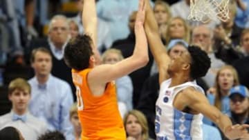 Dec 11, 2016; Chapel Hill, NC, USA; Tennessee Volunteers forward John Fulkerson (10) shoots over North Carolina Tar Heels forward Tony Bradley (5) during the second half at Dean E. Smith Center. North Carolina won 73-71. Mandatory Credit: Evan Pike-USA TODAY Sports