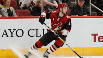 GLENDALE, AZ - FEBRUARY 14: Arizona Coyotes defenseman Niklas Hjalmarsson (4) controls the puck during the NHL hockey game between the St. Louis Blues and the Arizona Coyotes on February 14, 2019 at Gila River Arena in Tempe, Arizona. (Photo by Kevin Abele/Icon Sportswire via Getty Images)
