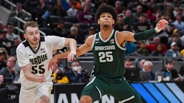 INDIANAPOLIS, INDIANA - MARCH 12: Malik Hall #25 of the Michigan State Spartans fights for position for a rebound against Sasha Stefanovic #55 of the Purdue Boilermakers during the second half of a Men's Big Ten Tournament Semifinals game at Gainbridge Fieldhouse on March 12, 2022 in Indianapolis, Indiana. The Purdue Boilermakers won the game 75-70 over the Michigan State Spartans. (Photo by Aaron J. Thornton/Getty Images)