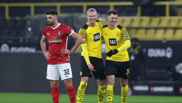 Thomas Meunier and Erling Haaland. (Photo by Lars Baron/Getty Images)