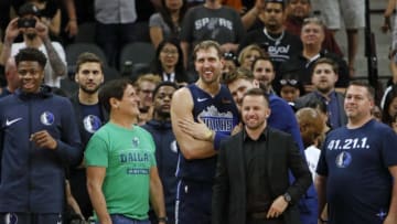 SAN ANTONIO, TX - APRIL 10: Dirk Nowitzki #41 of the Dallas Mavericks watches closing seconds of game against the San Antonio Spurs with Mark Cuban on his right at AT&T Center on April 10, 2019 in San Antonio, Texas. NOTE TO USER: User expressly acknowledges and agrees that , by downloading and or using this photograph, User is consenting to the terms and conditions of the Getty Images License Agreement. (Photo by Ronald Cortes/Getty Images)