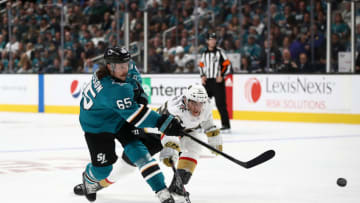 SAN JOSE, CALIFORNIA - OCTOBER 04: Erik Karlsson #65 of the San Jose Sharks is defended by Tomas Nosek #92 of the Vegas Golden Knights at SAP Center on October 04, 2019 in San Jose, California. (Photo by Ezra Shaw/Getty Images)