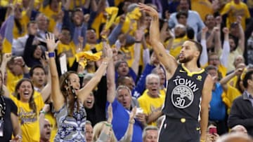 OAKLAND, CA - MAY 01: Stephen Curry #30 of the Golden State Warriors reacts after making a three-point basket against the New Orleans Pelicans during Game Two of the Western Conference Semifinals during the 2018 NBA Playoffs at ORACLE Arena on May 1, 2018 in Oakland, California. NOTE TO USER: User expressly acknowledges and agrees that, by downloading and or using this photograph, User is consenting to the terms and conditions of the Getty Images License Agreement. (Photo by Ezra Shaw/Getty Images)