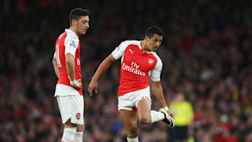 LONDON, ENGLAND - APRIL 21: Mesut Ozil and Alexis Sanchez of Arsenal prepare to kick off during the Barclays Premier League match between Arsenal and West Bromwich Albion at the Emirates Stadium on April 21, 2016 in London, England. (Photo by Paul Gilham/Getty Images)