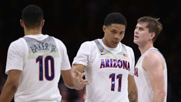 TUCSON, ARIZONA - JANUARY 16: Ira Lee #11 of the Arizona Wildcats high fives Jemarl Baker Jr. #10 after a slam dunk against the Utah Utes during the second half of the NCAAB game at McKale Center on January 16, 2020 in Tucson, Arizona. (Photo by Christian Petersen/Getty Images)