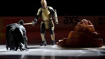 LAS VEGAS, NV - OCTOBER 15: The Golden Knight (R) performs on the ice before the Vegas Golden Knights' game against the Boston Bruins at T-Mobile Arena on October 15, 2017 in Las Vegas, Nevada. The Golden Knights won 3-1. (Photo by Ethan Miller/Getty Images)