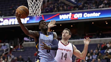 WASHINGTON, DC - JANUARY 18: James Ennis #8 of the Memphis Grizzlies puts up a shot in front of Jason Smith #14 of the Washington Wizards at Verizon Center on January 18, 2017 in Washington, DC. NOTE TO USER: User expressly acknowledges and agrees that, by downloading and or using this photograph, User is consenting to the terms and conditions of the Getty Images License Agreement. (Photo by Rob Carr/Getty Images)