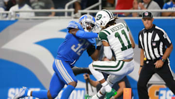 DETROIT, MI - SEPTEMBER 10: Robby Anderson #11 of the New York Jets scores a touchdown in front of Tavon Wilson #32 of the Detroit Lions in the second quarter at Ford Field on September 10, 2018 in Detroit, Michigan. (Photo by Rey Del Rio/Getty Images)
