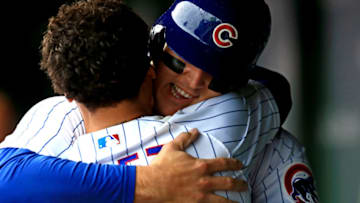 CHICAGO, IL - SEPTEMBER 30: Anthony Rizzo #44 of the Chicago Cubs celebrates with Javier Baez #9 in the dugout after scoring a run in the third inning against the St. Louis Cardinals at Wrigley Field on September 30, 2018 in Chicago, Illinois. (Photo by Andrew Weber/Getty Images)