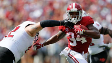 TUSCALOOSA, AL - SEPTEMBER 08: Damien Harris #34 of the Alabama Crimson Tide rushes against Forrest Merrill #92 of the Arkansas State Red Wolves at Bryant-Denny Stadium on September 8, 2018 in Tuscaloosa, Alabama. (Photo by Kevin C. Cox/Getty Images)