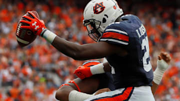 AUBURN, AL - OCTOBER 07: Kerryon Johnson No. 21 of the Auburn Tigers reacts after scoring a touchdown against the Mississippi Rebels with Darius James No. 78 at Jordan Hare Stadium on October 7, 2017 in Auburn, Alabama. (Photo by Kevin C. Cox/Getty Images)