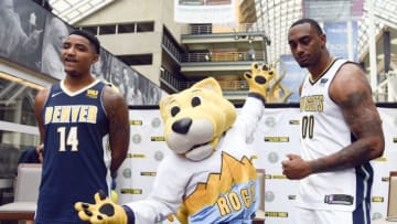 DENVER, CO - AUGUST 8: Denver Nuggets mascot Rocky along with Gary Harris (14) and Darrell Arthur (00) unveil their new team jersey on August 8, 2017 during a pep rally in Denver, Colorado the DCPA. (Photo by John Leyba/The Denver Post via Getty Images)