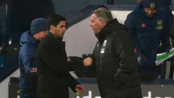 Arsenal's Spanish manager Mikel Arteta (L) greets West Bromwich Albion's English head coach Sam Allardyce (R) at the end of the English Premier League football match between West Bromwich Albion and Arsenal at The Hawthorns stadium in West Bromwich, central England, on January 2, 2021. (Photo by Tim Keeton / POOL / AFP) / RESTRICTED TO EDITORIAL USE. No use with unauthorized audio, video, data, fixture lists, club/league logos or 'live' services. Online in-match use limited to 120 images. An additional 40 images may be used in extra time. No video emulation. Social media in-match use limited to 120 images. An additional 40 images may be used in extra time. No use in betting publications, games or single club/league/player publications. / (Photo by TIM KEETON/POOL/AFP via Getty Images)