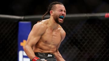 HOUSTON, TEXAS - FEBRUARY 12: Kyler Phillips reacts after winning his bantamweight fight against Marcelo Rojo of Argentina via submission during UFC 271 at Toyota Center on February 12, 2022 in Houston, Texas. (Photo by Carmen Mandato/Getty Images)