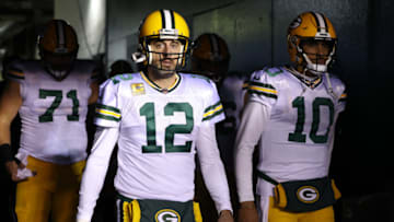 PHILADELPHIA, PENNSYLVANIA - NOVEMBER 27: Aaron Rodgers #12 and Jordan Love #10 of the Green Bay Packers walk to the field before the game against the Philadelphia Eagles at Lincoln Financial Field on November 27, 2022 in Philadelphia, Pennsylvania. (Photo by Scott Taetsch/Getty Images)