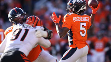 DENVER, COLORADO - DECEMBER 19: Teddy Bridgewater #5 of the Denver Broncos throws the ball during the first quarter against the Cincinnati Bengals at Empower Field At Mile High on December 19, 2021 in Denver, Colorado. (Photo by Matthew Stockman/Getty Images)