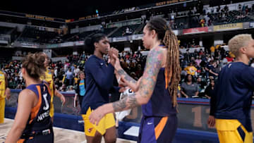 INDIANAPOLIS, IN - JUNE 9: Teaira McCowan #15 of Indiana Fever hi-fives Brittney Griner #42 of Phoenix Mercury after the game on June 9, 2019 at the Bankers Life Fieldhouse in Indianapolis, Indiana. NOTE TO USER: User expressly acknowledges and agrees that, by downloading and or using this photograph, User is consenting to the terms and conditions of the Getty Images License Agreement. Mandatory Copyright Notice: Copyright 2019 NBAE (Photo by Ron Hoskins/NBAE via Getty Images)