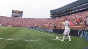 Aug 2, 2014; Ann Arbor, MI, USA; Real Madrid midfielder Luka Modric (19) does a corner kick during the game against the Manchester United at Michigan Stadium. Mandatory Credit: Tim Fuller-USA TODAY Sports