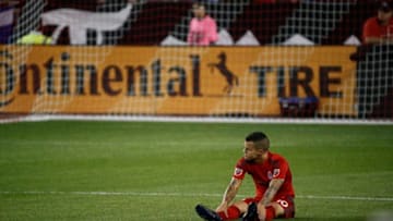 TORONTO, ON - JULY 2: Seattle Sounders midfielder Osvaldo Alonso (6) slows down Toronto FC forward Jordan Hamilton (22) attempt. Toronto FC V Seattle Sounders in 1st half action of MLS regular season play at BMO Field. (Rick Madonik/Toronto Star via Getty Images)